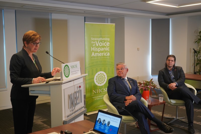 State Senator Nellie Pou introduces Senator Bob Menendez while Washington Post Editor Eli Lopez looks on
